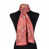 Red silk scarf with geometric print inspired by Turkish art motifs